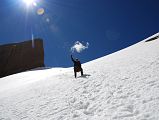 37 Gyan Tamang Descending The Snow Slopes On The Eastern Side Of The Nandi Pass On Mount Kailash Inner Kora Nandi Parikrama The descent from Nandi Pass to the Eastern Valley is on snow at first. Here my Nepalese guide Gyan Tamang descends with Nandi on the upper left.